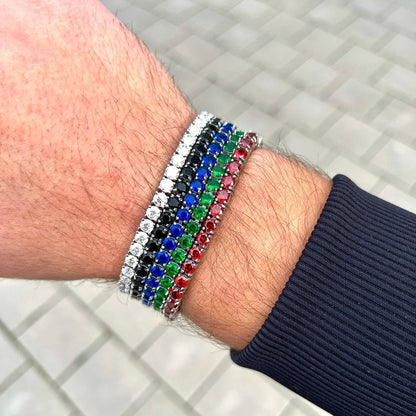 Multicolored beaded bracelet on a wrist with a tiled floor background
