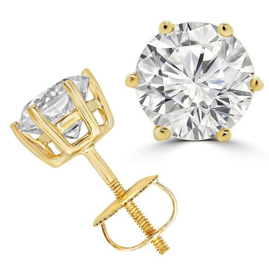 Close-up image of a man's ear wearing a silver diamond stud earring.