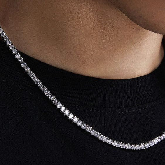Close-up of a diamond necklace on a black background