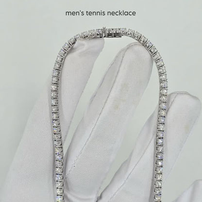 Men's tennis necklace on a white glove with a light gray background